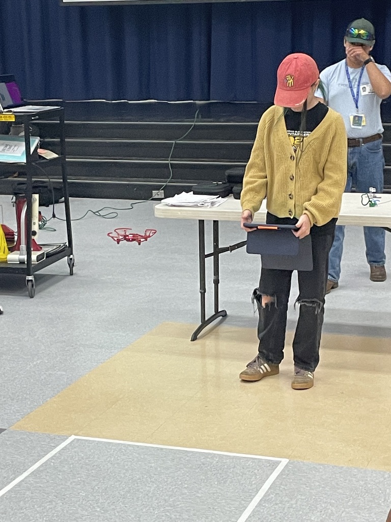Student flying a drone