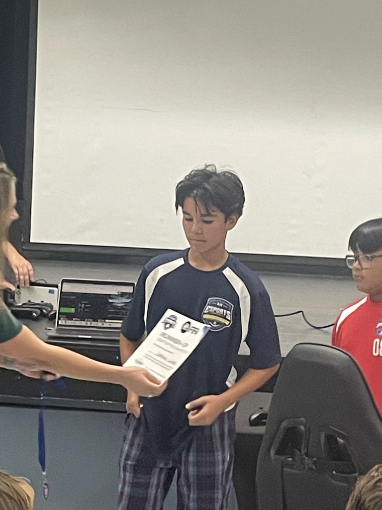 Student receiving award
