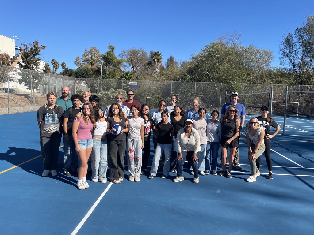 teachers and students on volleyball court