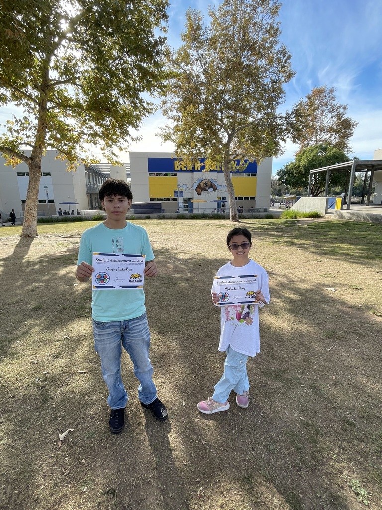 Students holding awards