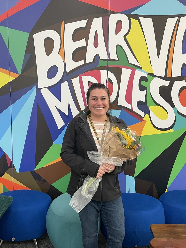 Picture of teacher with flowers