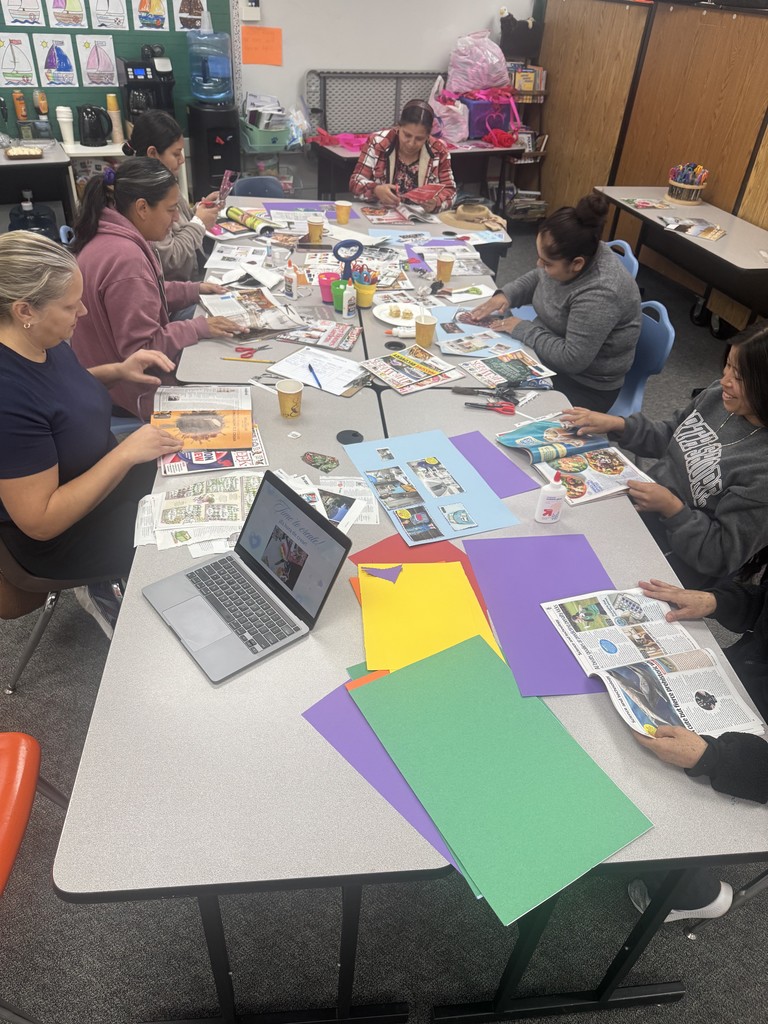 Participants creating in the process of creating their vision boards