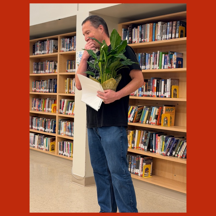 Aaron White fumbling for words as he accepts Mission's Teacher of the Year recognition