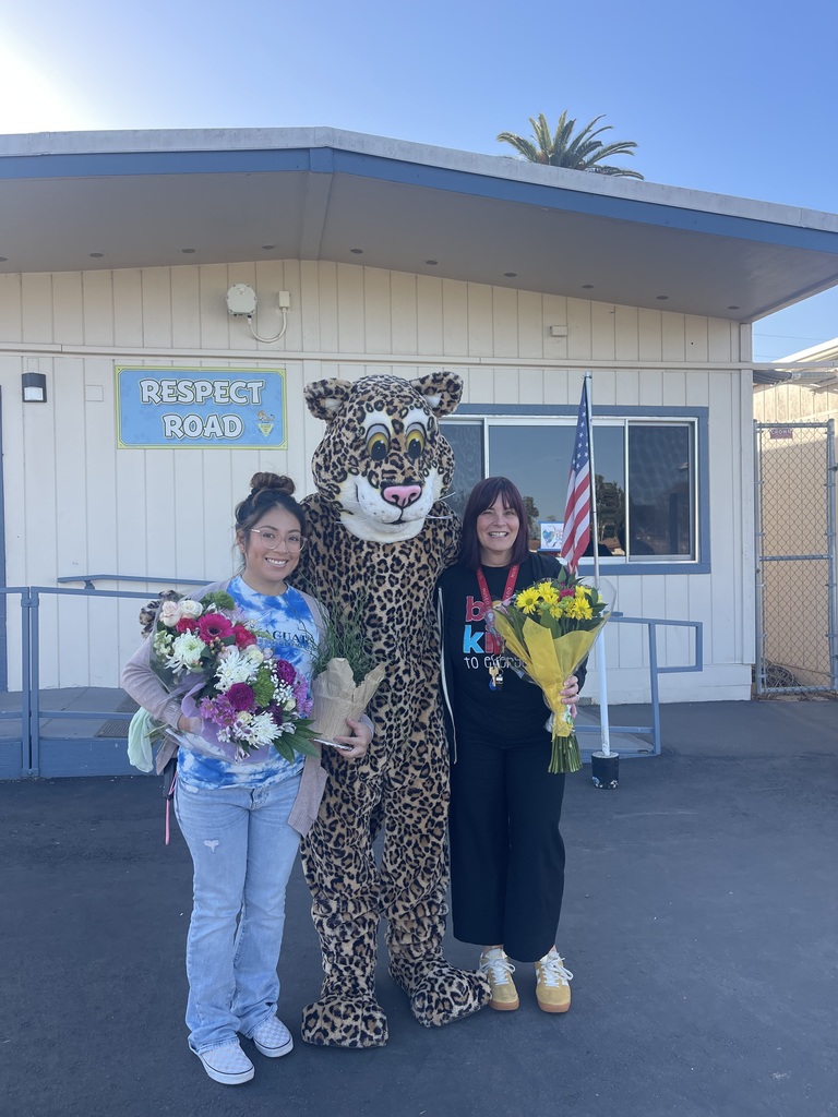 Certificated and Classified employees with jaguar mascot