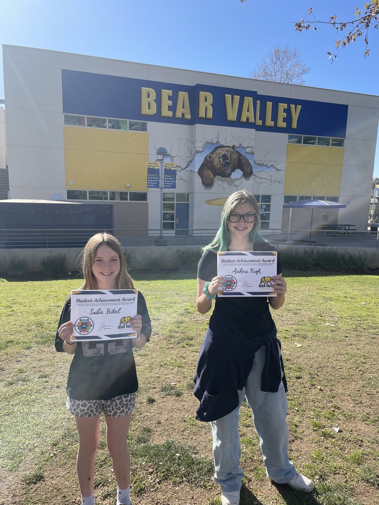 Students holding awards