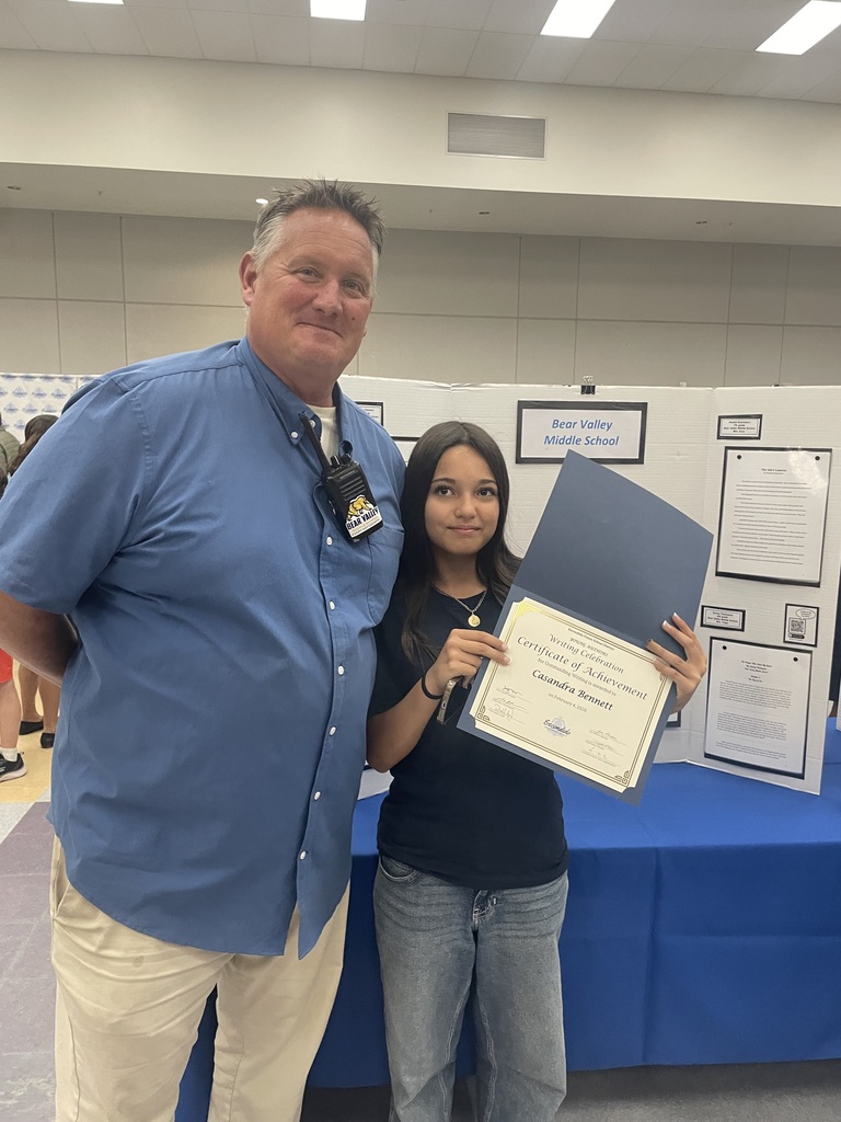 picture of student with certificate
