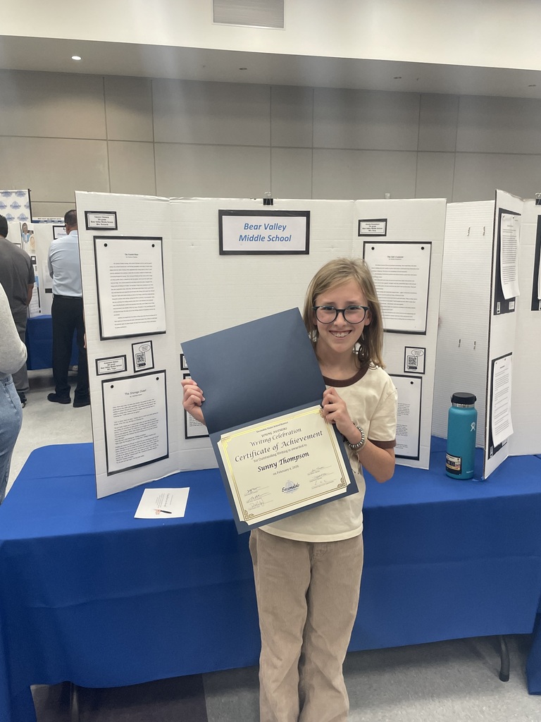 Picture of student with certificate