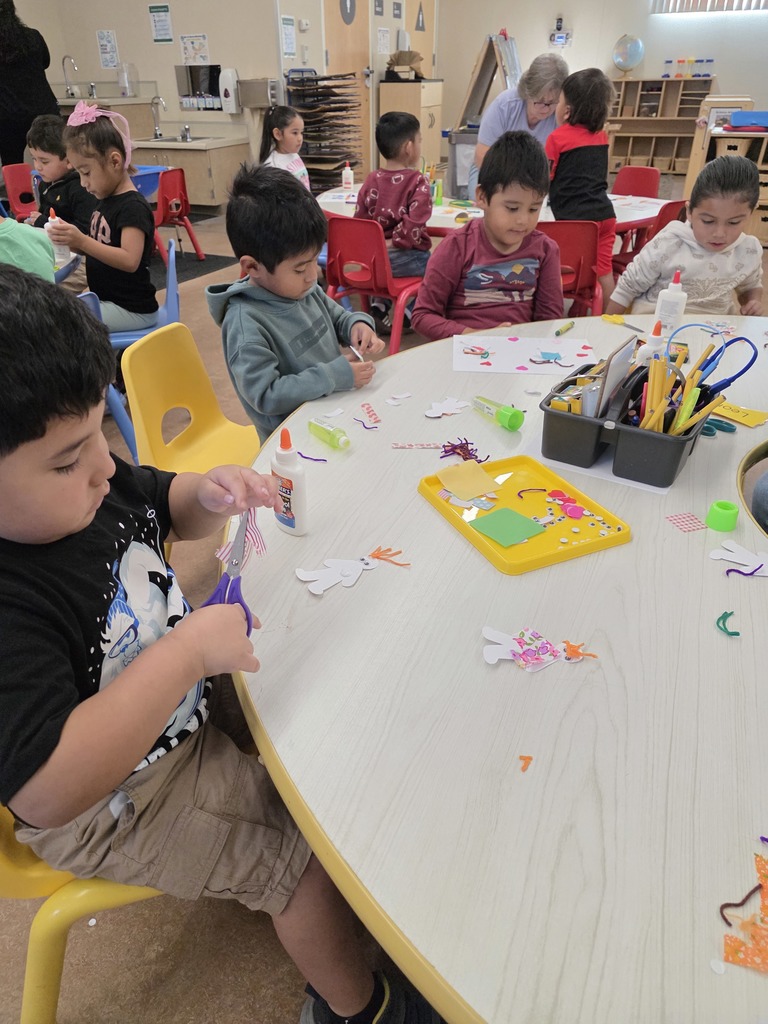 Students completing art work 