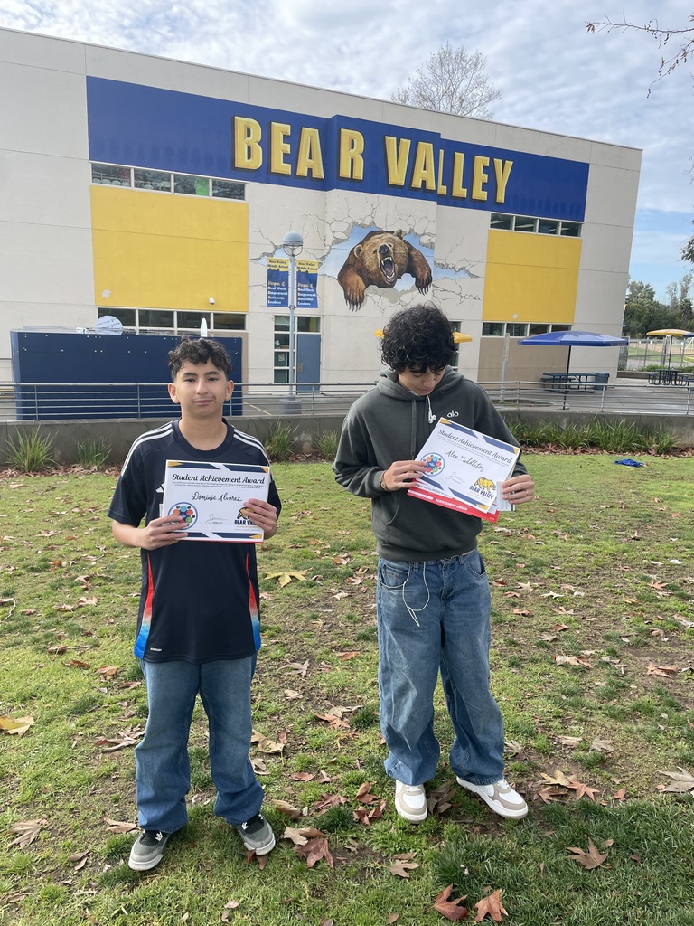 Picture of students holding their awards