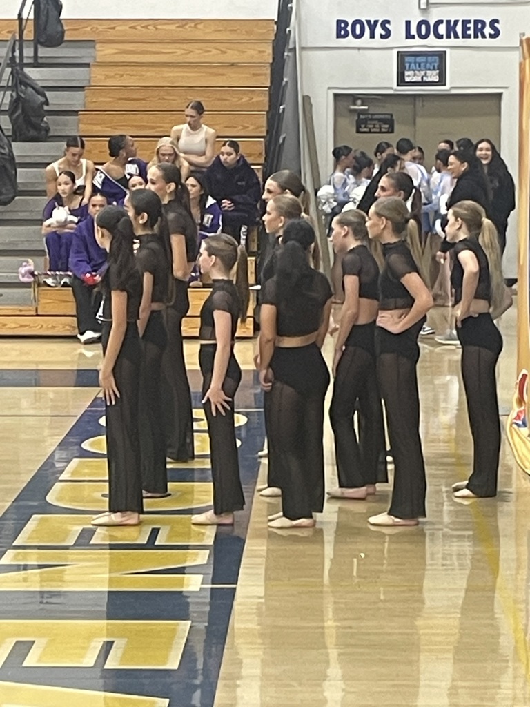 dance team getting ready to perform