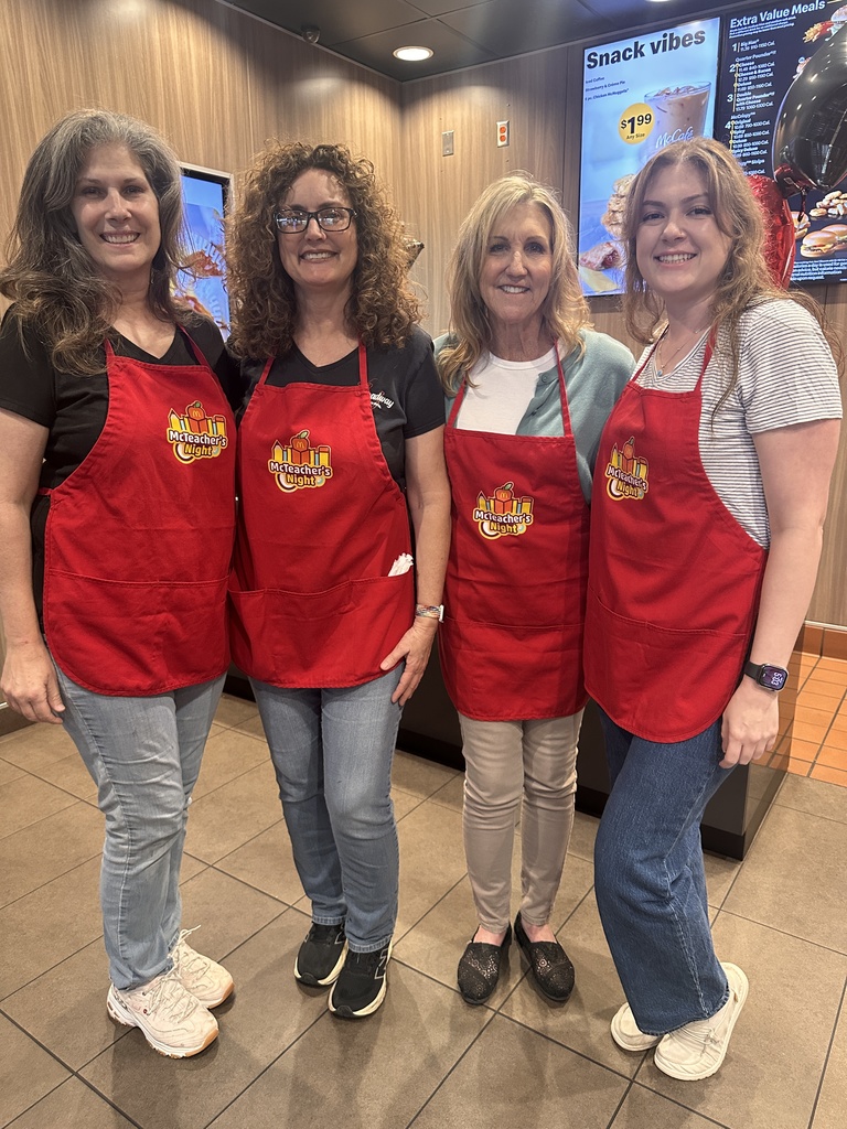 Kinder Teachers with mcteacher's night aprons at McDonald's