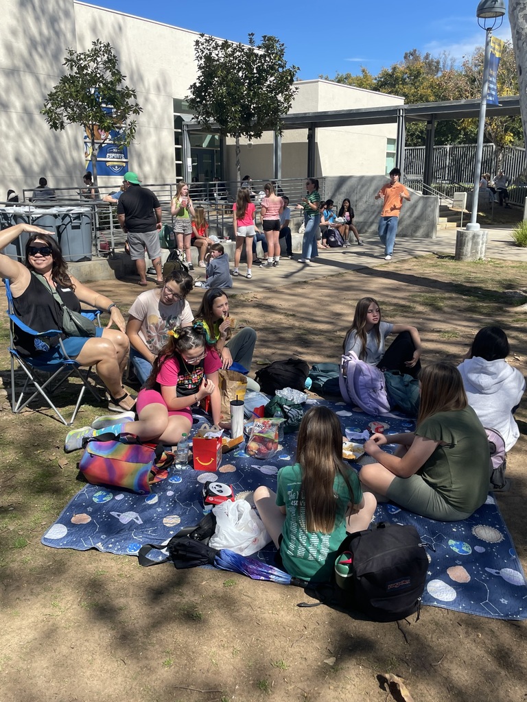 Parents eating with students