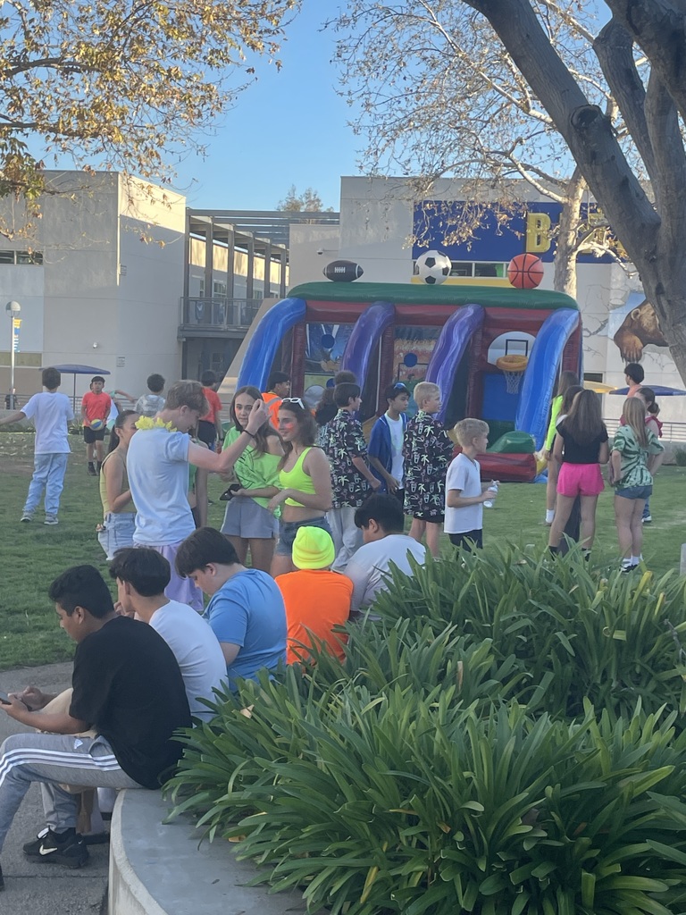 Students gathering in the quad area during dance