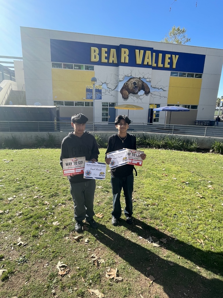 Students holding awards