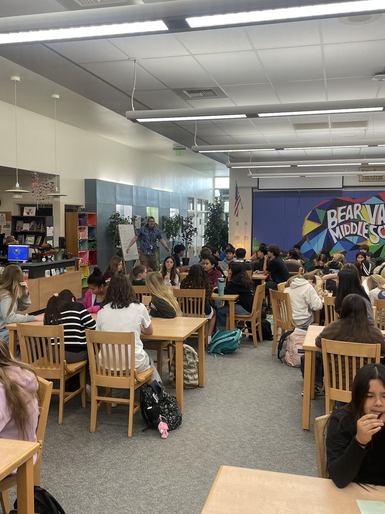 WEB students listening to Mr. Drew