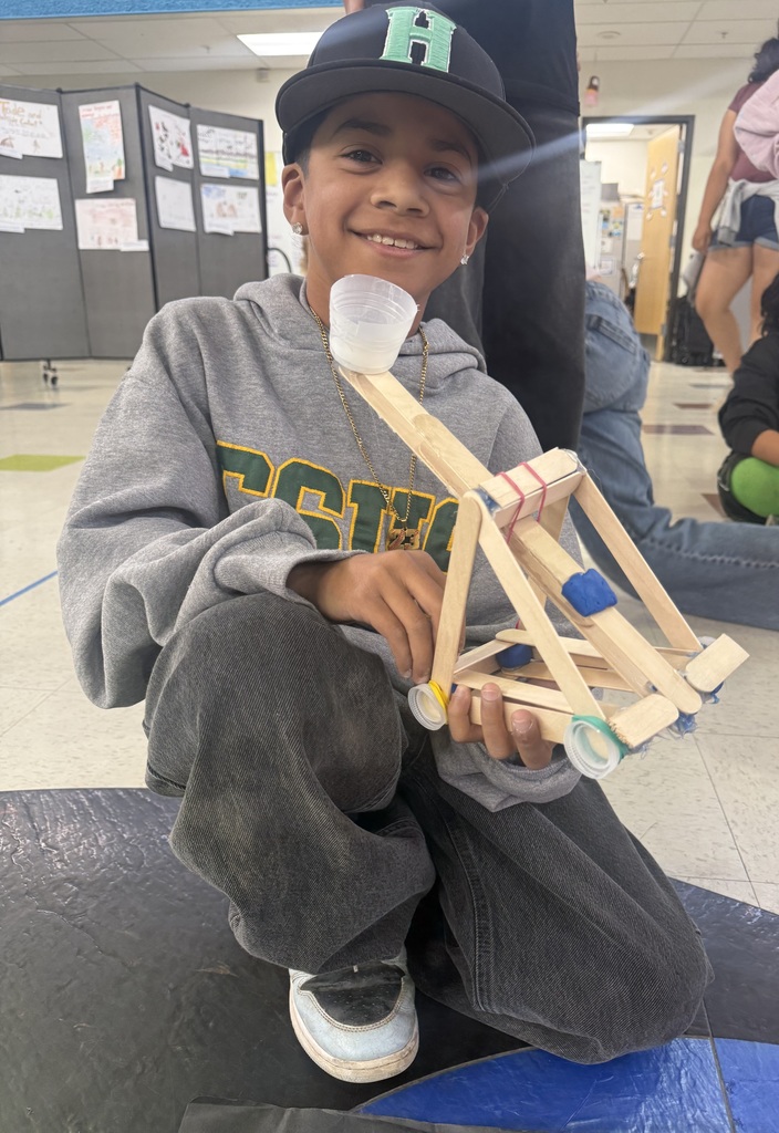 student with their catapult