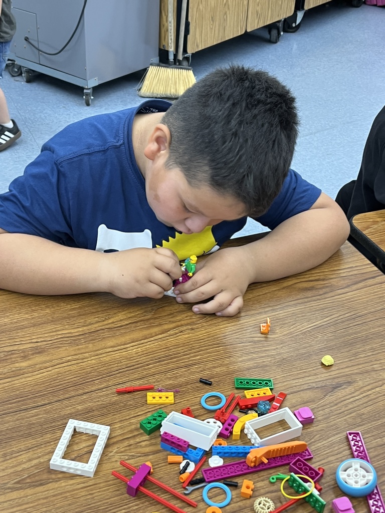 Student working with Legos