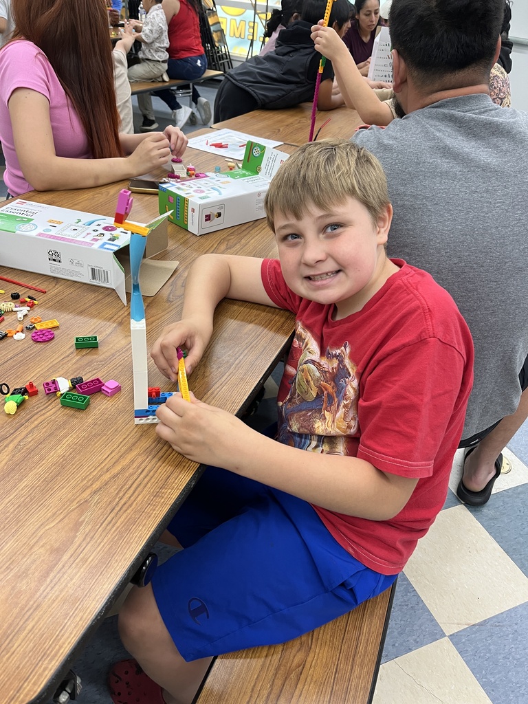 Student working with Legos