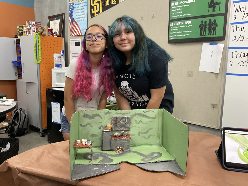 Students showing their 3d project for the social studies presentation. 