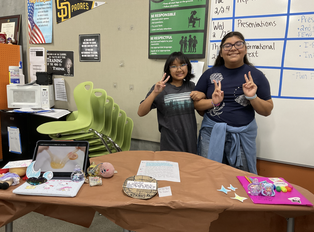 Students showing their 3d project for the social studies presentation. 