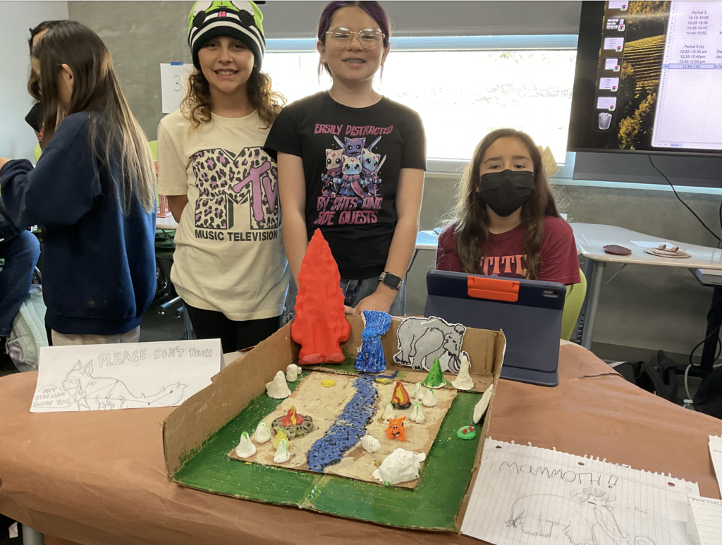 Students showing their 3d project for the social studies presentation. 