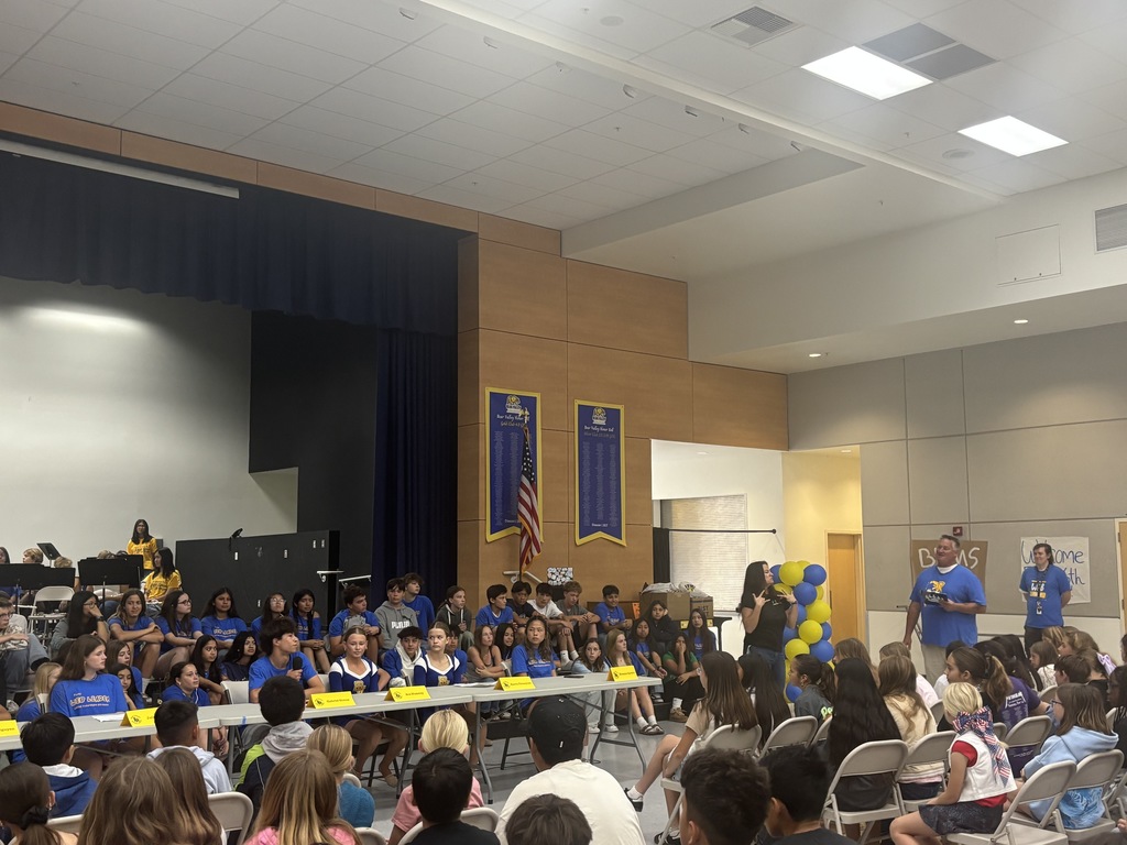 student panel in front of 5th graders