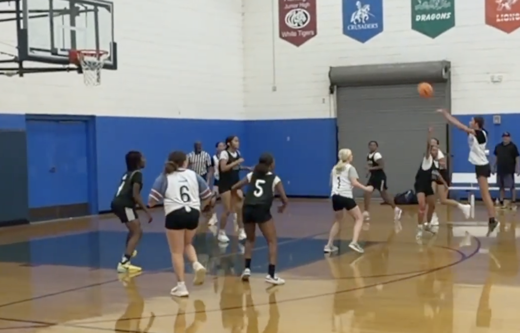 Basketball player shooting a basket