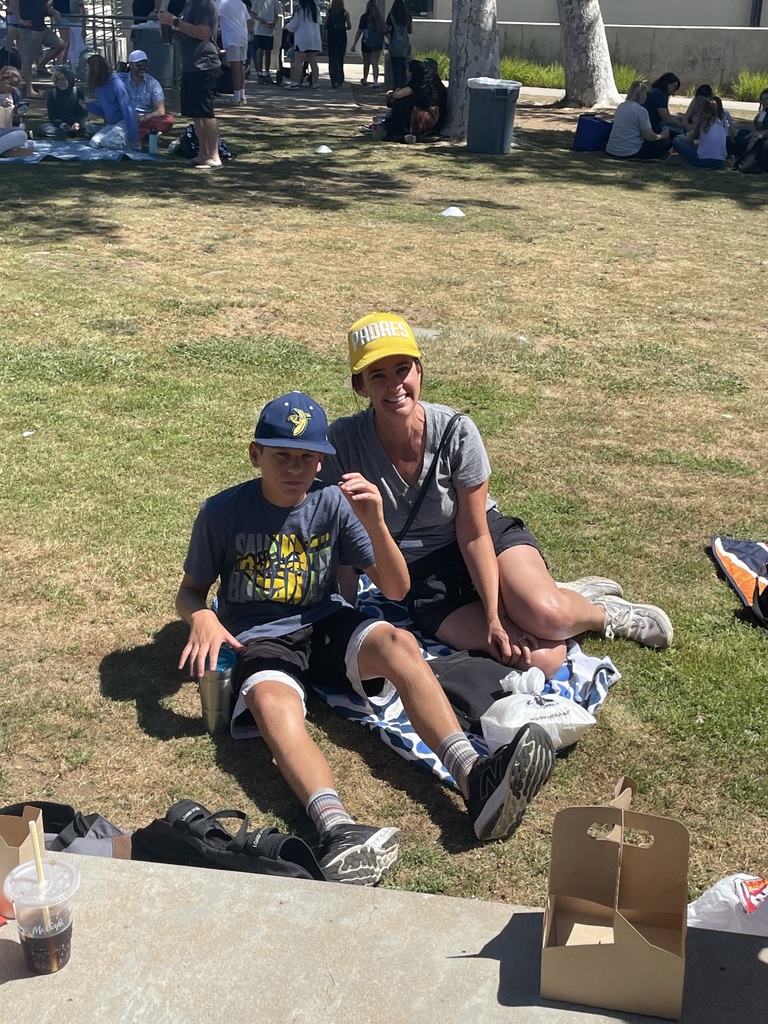 Parent and student eating together