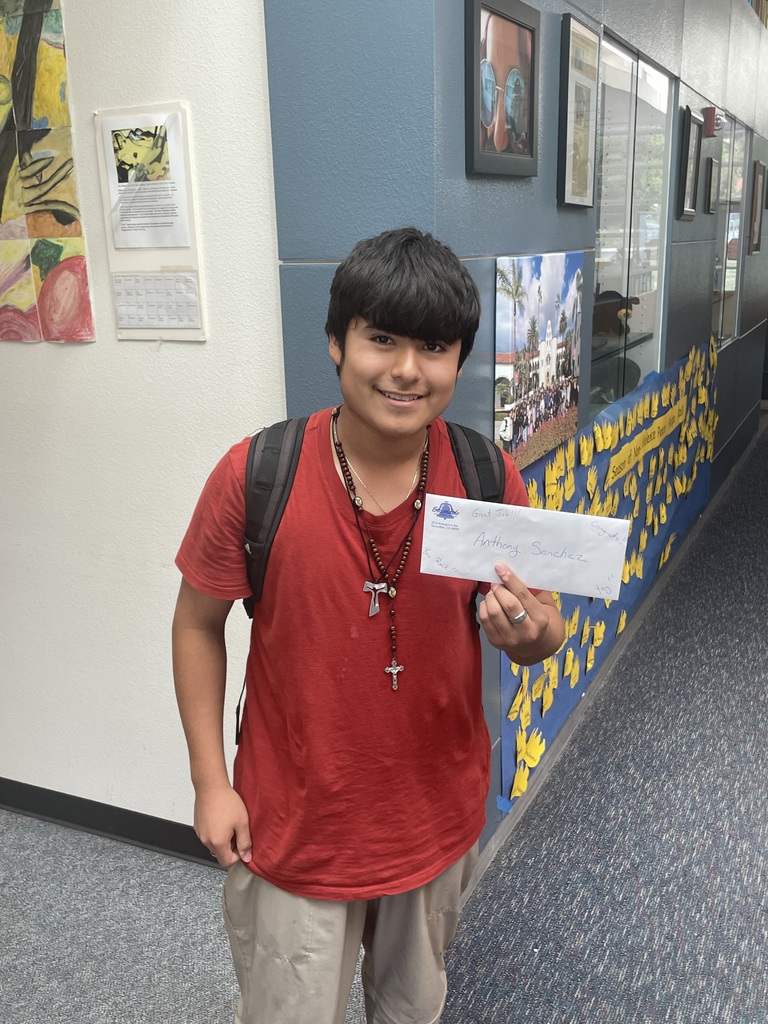 Top selling student holding gift card