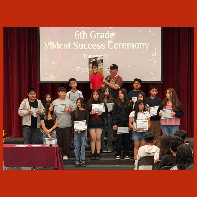 A group shot of the 6th Grade Platinum honorees with our Prinicipal, Jason Hoff, holding a portrait of Aiden