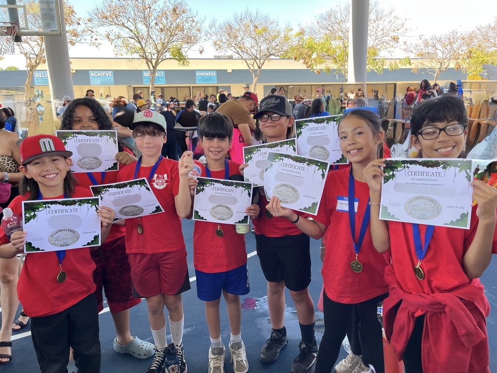 STEM day student showing their 1st place certificates