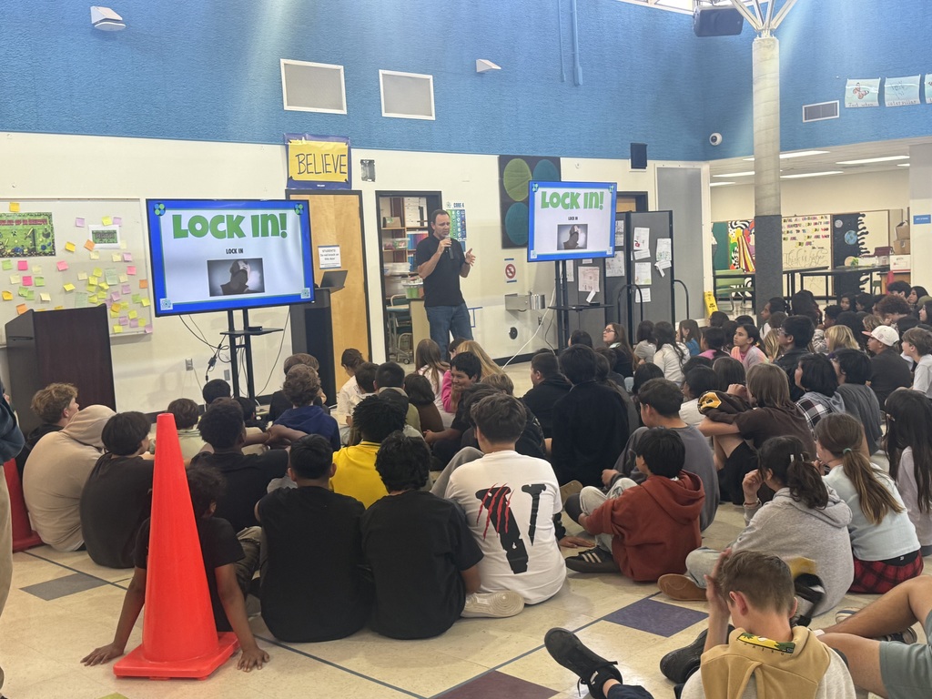principal presenting at an assembly