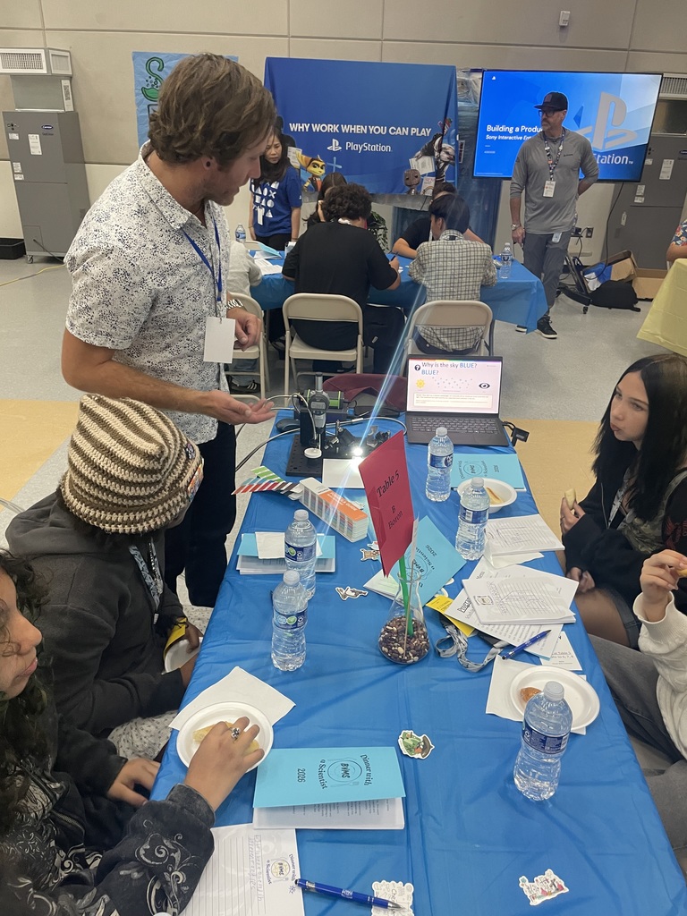 Scientist presenting to students