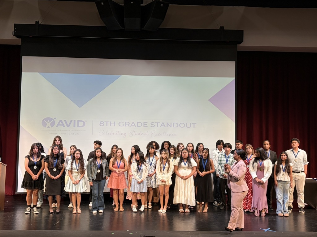 AVID students on stage receiving awards