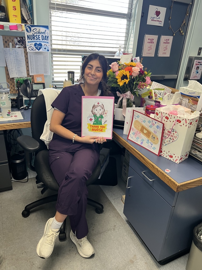Glen View  nurse with flowers and presents 