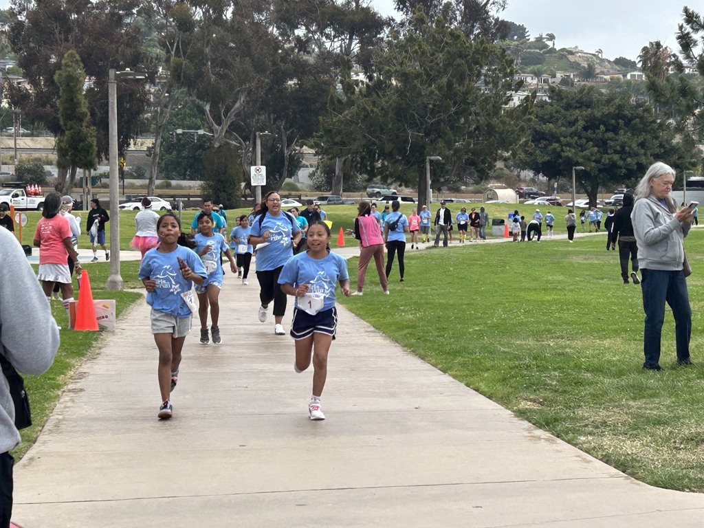Students and parents running the 5k