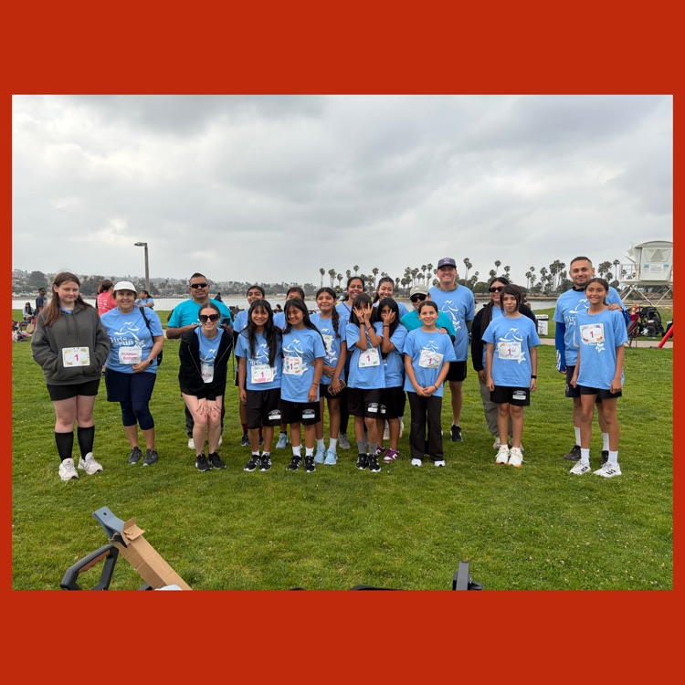 Mission's 2025-2026 Heart & Sole Running Team with the team coaches and this year's Running Buddies