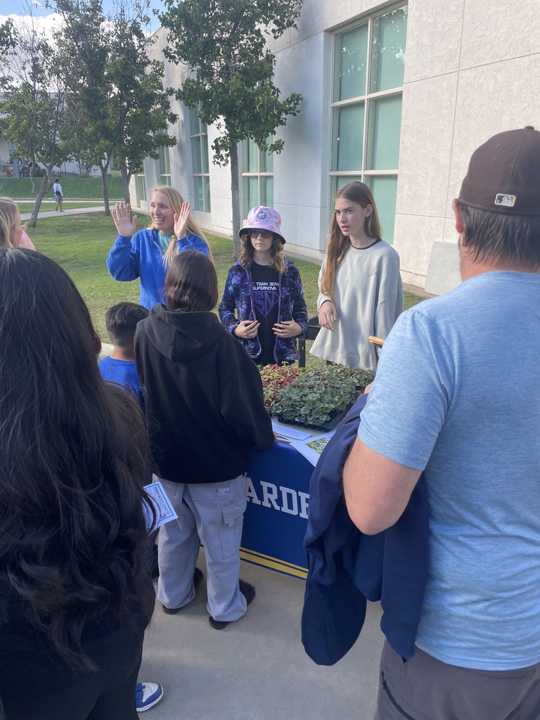 students presenting garden club