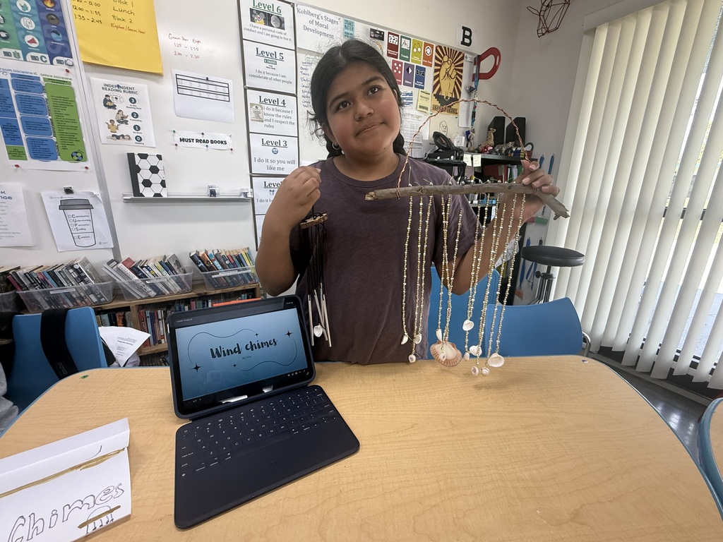 student with wind chime project