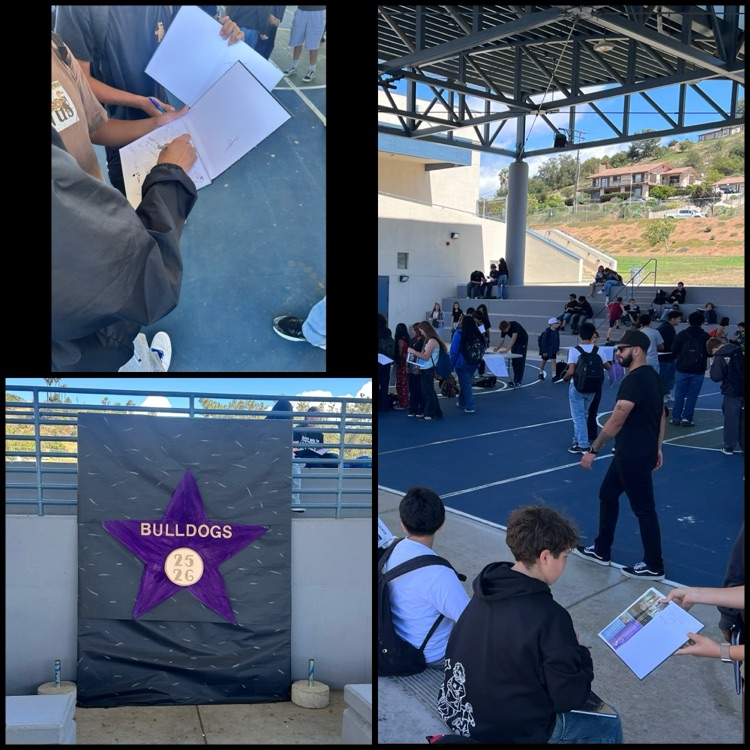 yearbook signing at Rincon with students receiving their books and signing away 
