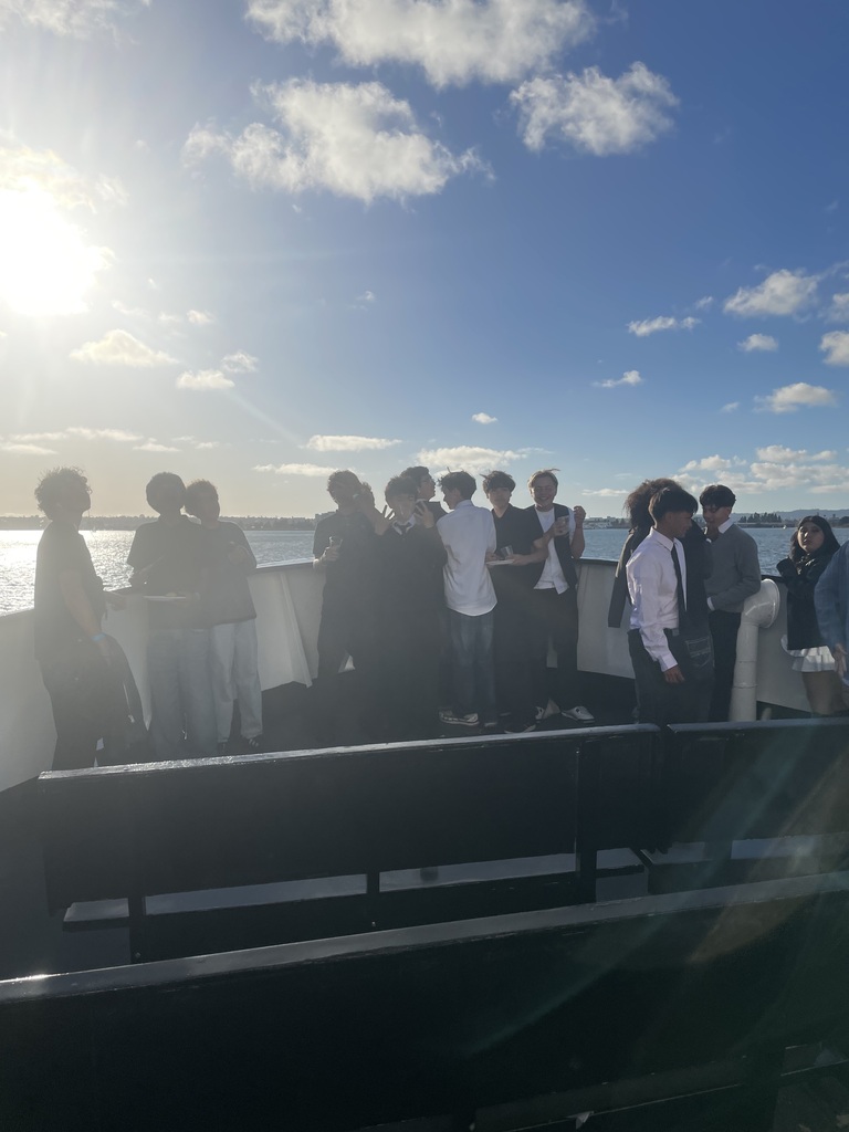 Students on front of boat