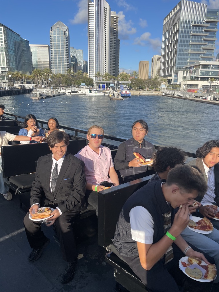 Students on top of boat