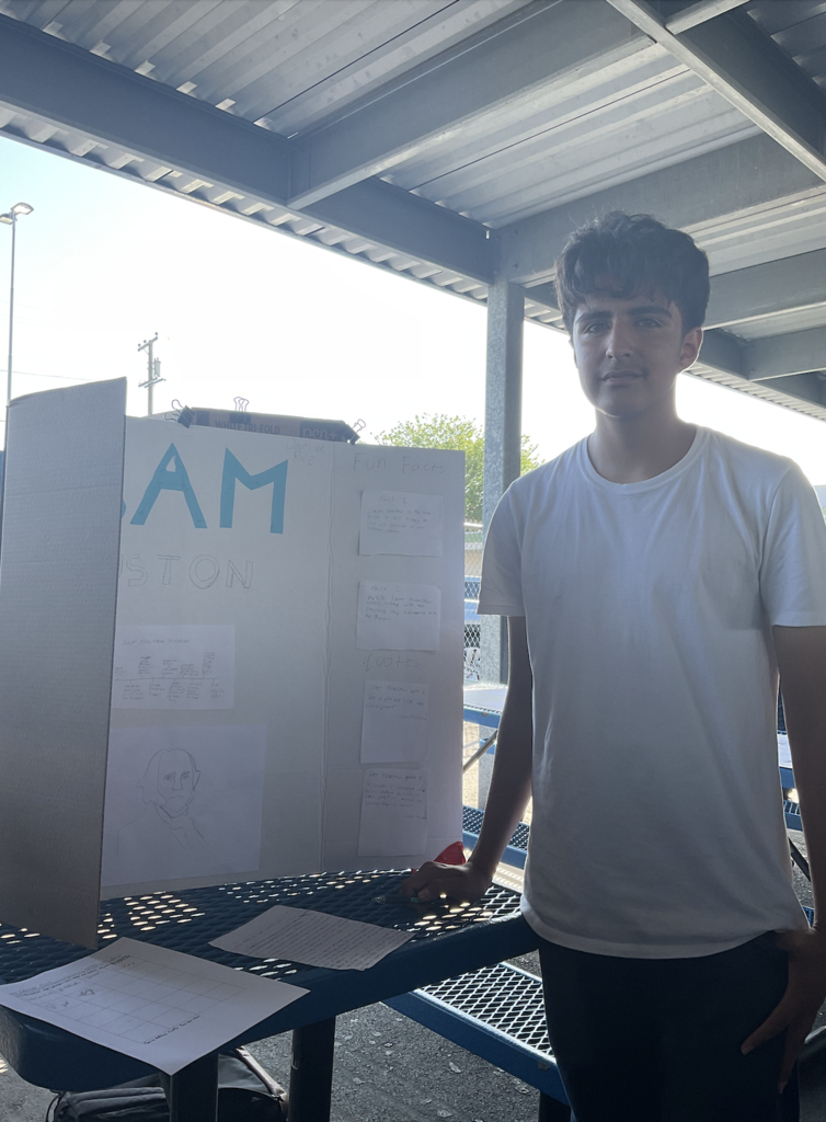 Student presenting at the Americans on Display event. 