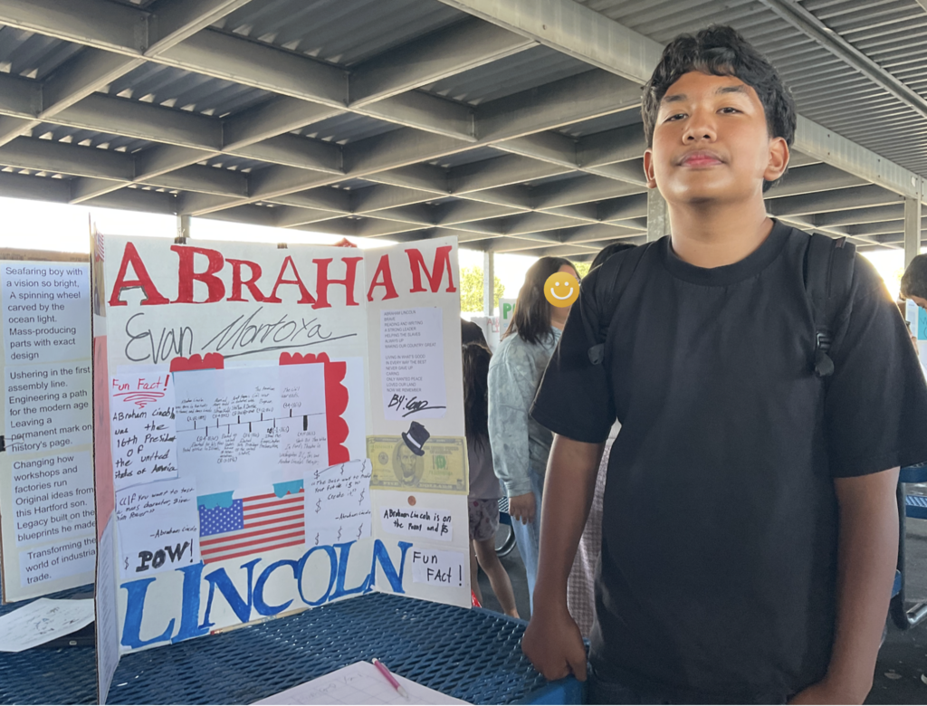 Student presenting at the Americans on Display event. 