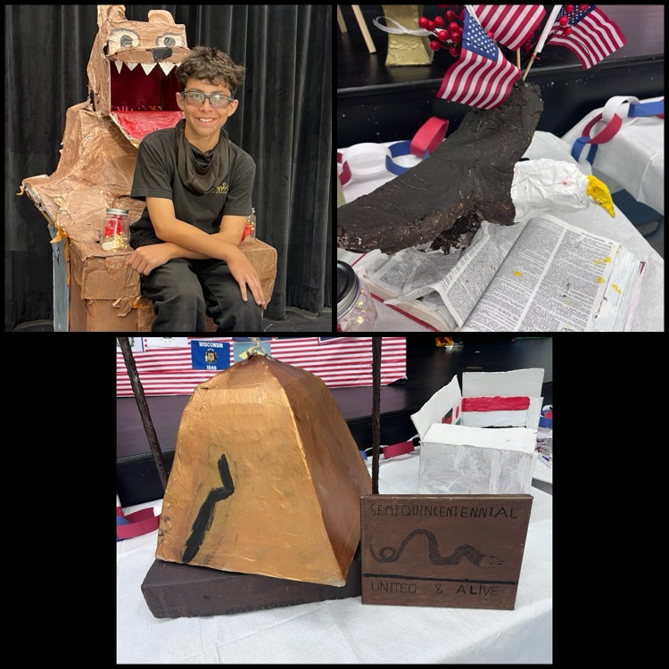 250th Anniversary art pieces of an eagle, bell and bear chair 
