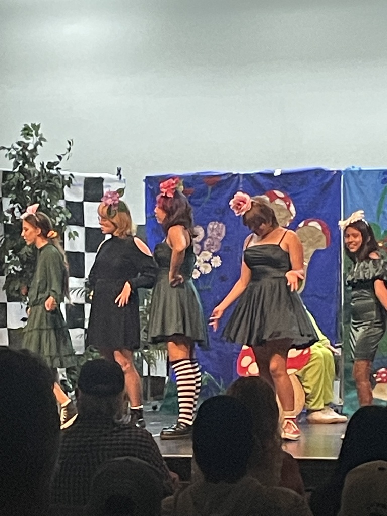 Students performing on stage