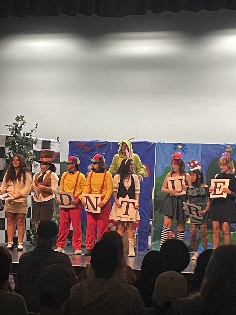 Students performing on stage