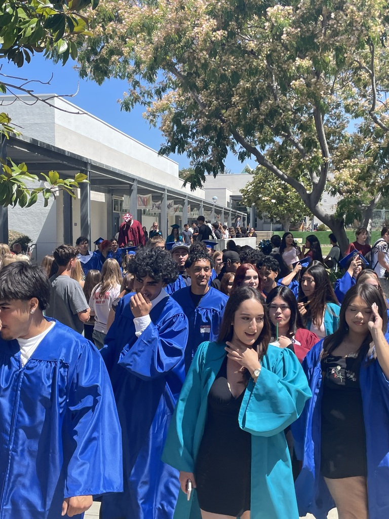 students taking part in grad walk