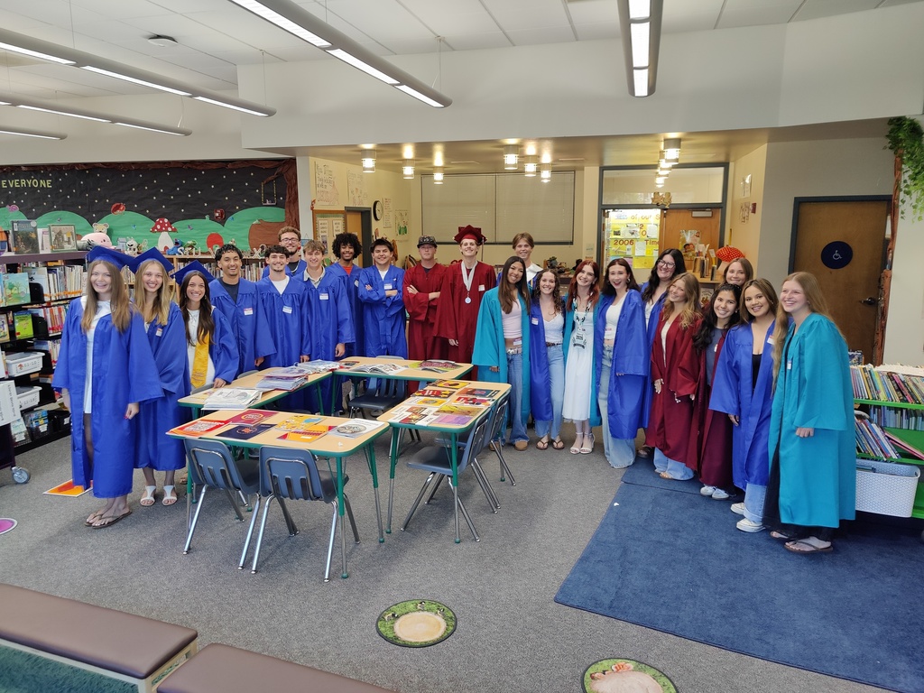 Bernardo's High School Seniors posing in the library