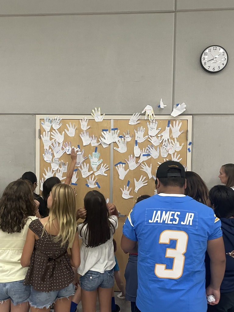 students and families taking part in an activity